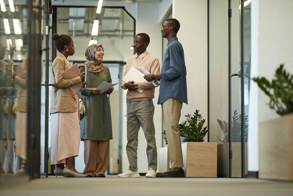 Small group conversation in a conference roundtable format where attendees contribute equally