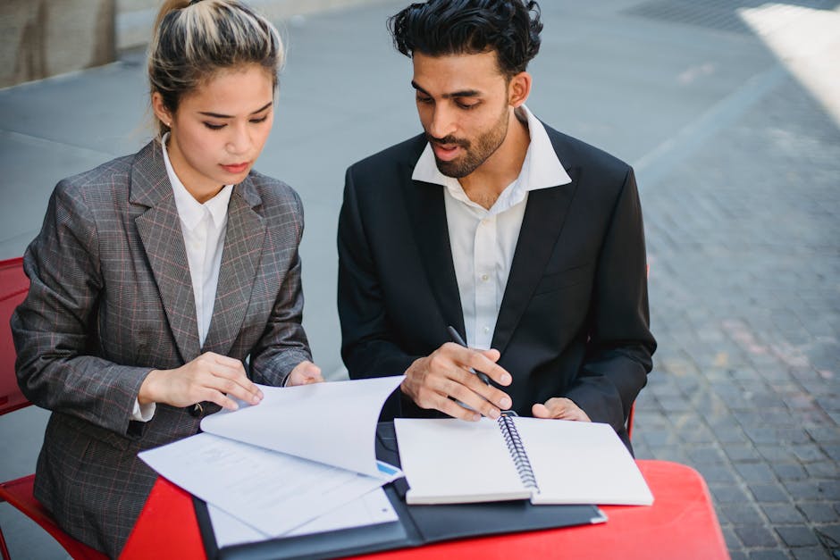 Two professionals in a one-to-one conversation representing the outcome of transparent event matchmaking