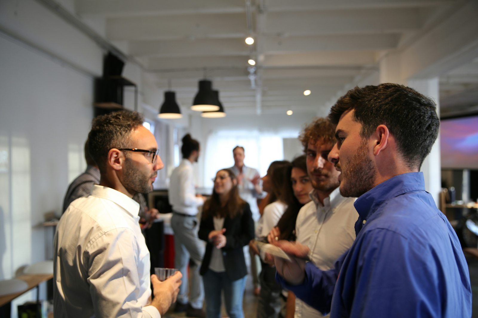 Attendees mingling at a networking event